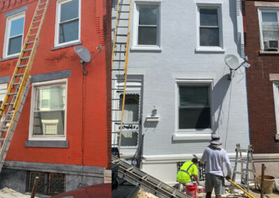 Before and after exterior house painting of a Philadelphia, PA brick rowhome facade, faded red brick repainted light grey with white window trim by UMAR Painting Co. Philly exterior painters
