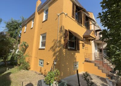 Finished warm ochre stucco front and side exterior on a Philadelphia home