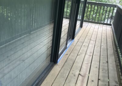 Partially sanded wood deck showing restoration progress in Philadelphia, PA