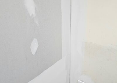 Patched drywall prepared for smooth interior painting in Philadelphia, PA