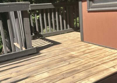 Weathered residential wood deck before sanding and refinishing in Philadelphia, PA